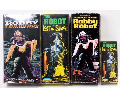 A collection of Polar Lights Robbie the Robot and Lost in Space, the Robot plastic kits to include a Polar Lights No. POL893 