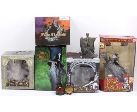 A collection of Lord of the Rings and mythical related action figures, and figurines to include a Sideshow Collectables Ganda