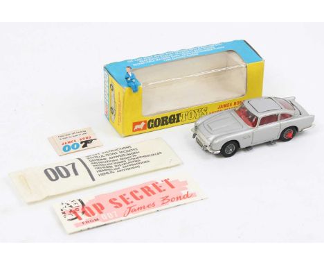 Corgi Toys No. 270 James Bond Aston Martin DB5 comprising of silver body with red interior, with Bond driver figure and Bandi