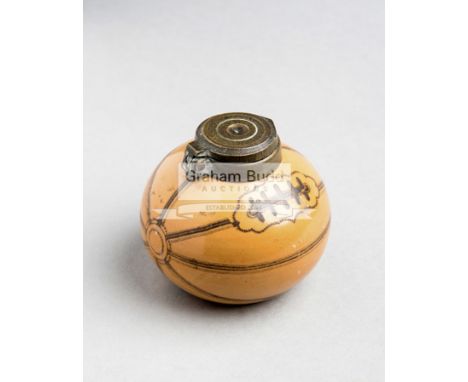 A Victorian gentleman's ceramic inkwell modelled and decorated as a leather panelled rugby ball,Design No.167873 registered i