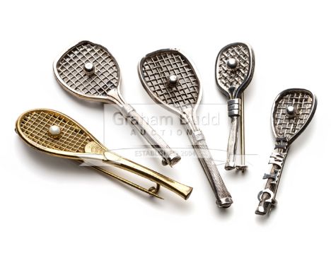 A group of five tennis racquet brooches, comprising a Victorian gilt metal fan tail racquet brooch with applied pearl ball an