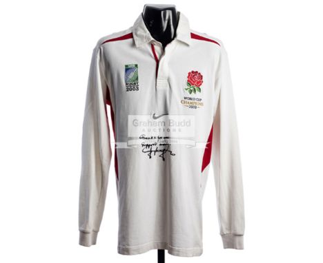 A signed Jonny Wilkinson England International white replica jersey,signed and dedicated in black marker pen, inscribed WORLD