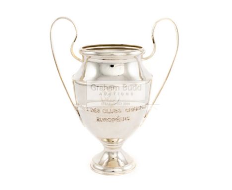 A UEFA Champions League 2018-19 commemorative replica trophy,the twin handled silver-plated baluster trophy cup with circular