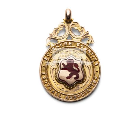 A 9ct gold and enamel medal awarded by the Scottish Southern Counties Football Association,undated, bearing hallmarks 375 and