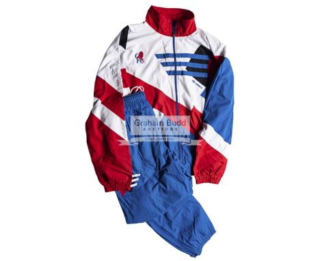 A Chelsea FC tracksuit worn by Kevin Wilson,the Umbro blue, white and red tracksuit zipped jacket with Chelsea crest on the r