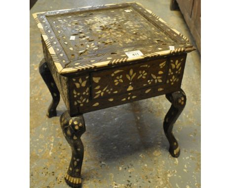 Distressed Indian hardwood lamp table of square form inlaid with bone and mother of pearl foliate decoration, standing on sty