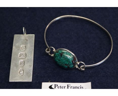 Solid silver ingot marked P &amp; M, hallmarked, weighing 31.8g approx., together with a small silver and jade bracelet weigh