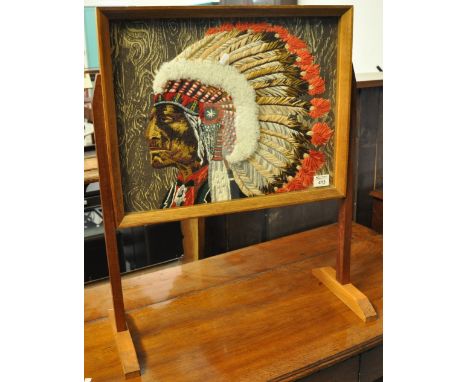 Mid Century oak framed tapestry firescreen depicting a Native American Indian.(B.P. 21% + VAT) 