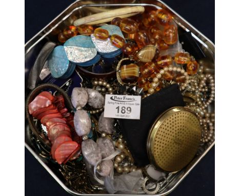 Metal tub containing assorted costume jewellery to include; amber coloured necklace, bracelets with enamel decoration, brooch