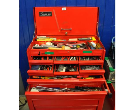 Snap on two stage tool cabinet chest, the upper section containing a large assortment of varied hand tools, pliers, nips, sna