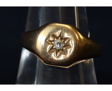 18ct gold signet ring inset with star design diamond. 8g approx, ring size R 7 1/2.(B.P. 21% + VAT) 