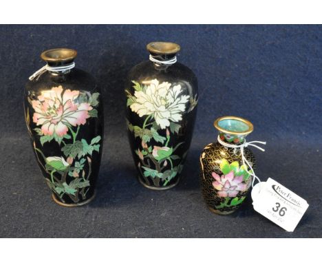 Pair of oriental cloisonne baluster vases decorated with flowers and birds, together with another oriental cloisonne floral b