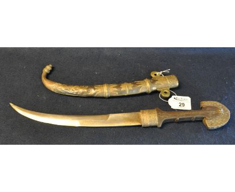 Middle Eastern design dagger with brass and copper scabbard and turned wooden and metal handle. (B.P. 21% + VAT) 