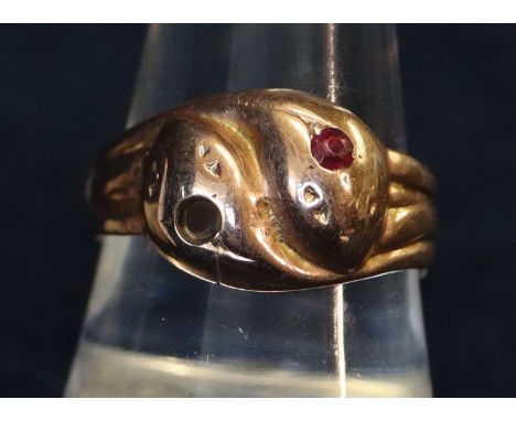 9ct gold double snake head dress ring with ruby eyes, one ruby missing, 3.6g approx. (B.P. 21% + VAT)Cut to shank.