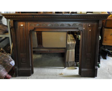 Good quality mahogany carved fire surround/mantelpiece having carved stylised floral and foliate decoration. (B.P. 21% + VAT)