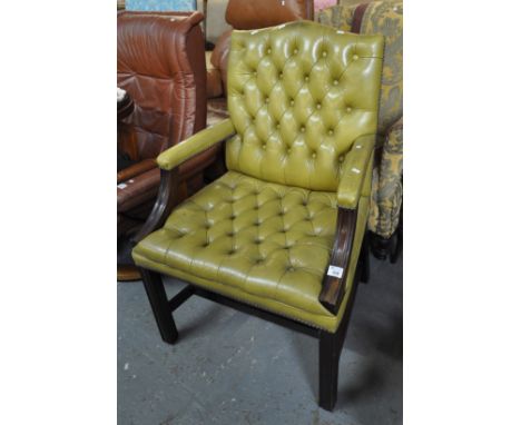 Green leather chesterfield style button back library open chair on square legs. 20th Century.(B.P. 21% + VAT) 