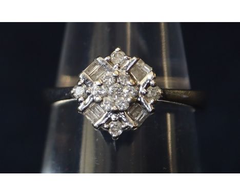 9ct white gold diamond cluster ring. Ring size K.(B.P. 21% + VAT) 