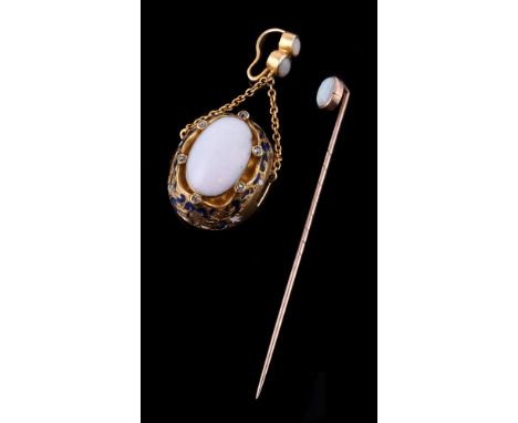 
	
		A Victorian later opal and white stone pendant, the central oval cabochon opal within six white stone tipped claws, with