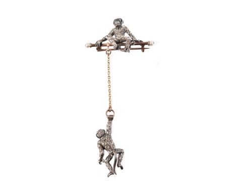 
	
		An early 20th century paste monkey brooch, circa 1900, the first monkey pavé set with circular cut white pastes, with gr