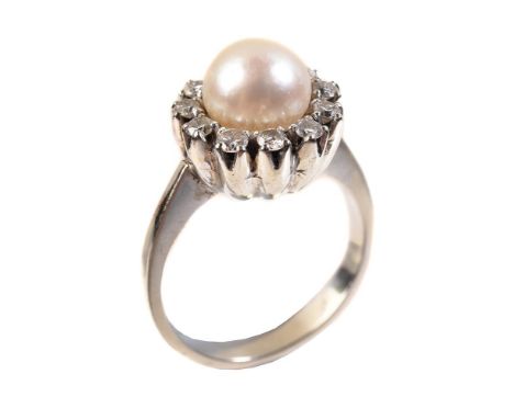 
	
		A diamond and cultured pearl cluster ring, the cultured pearl within a surround of brilliant cut diamonds, approximately