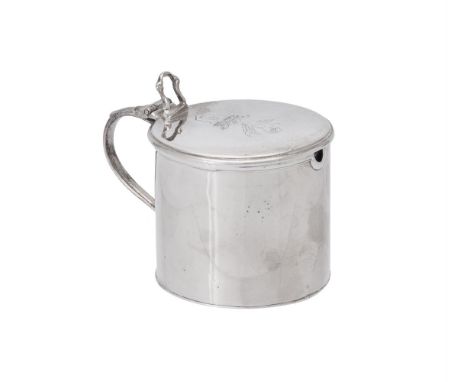 
	
		A late George II silver circular mustard pot, maker's mark W.A, London 1759, with an engraved crest to the flat cover an