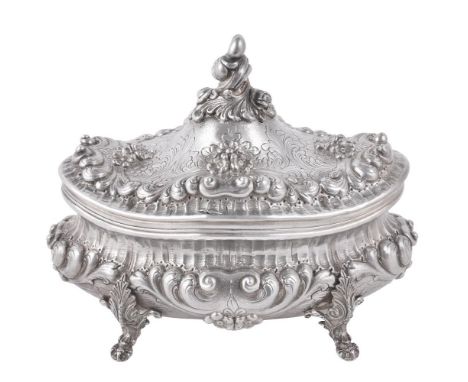 
	
		A Continental silver coloured shaped oval baluster box, stamped 925, 20th century, with a foliate finial to the domed co