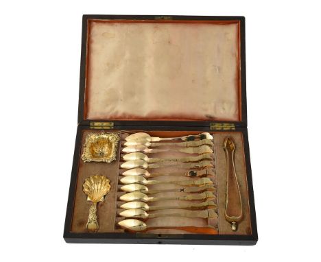 
	
		A cased French silver gilt set of twelve tea spoons, a caddy spoon, tea strainer and a pair of sugar tongs by Eusèbe Cal