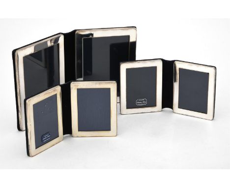
	
		Three silver mounted folding double photo frames by Kitney &amp; Co., London 1996 (1) and 2009 (2), the tallest 15.5cm (