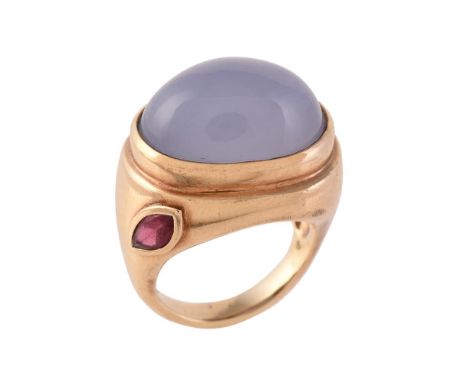 
	
		A 9 carat gold blue chalcedony and ruby dress ring, the oval cabochon chalcedony with a marquise cut ruby accent, London