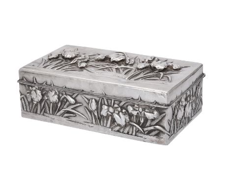 
	
		A Chinese silver rectangular box, circa 1900, chased with floral decoration to a matted round, 22.5cm (9in) long, with a