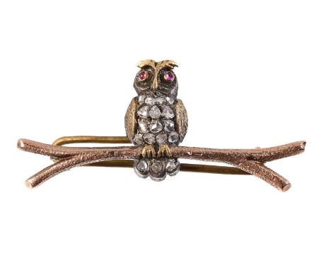 
	
		An early 20th century rose cut diamond and ruby owl brooch, circa 1900, the owl with circular cabochon ruby eyes, and ro