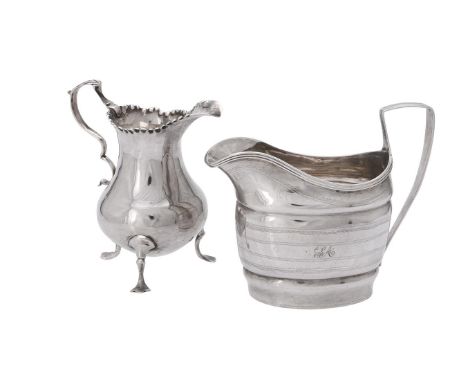 
	
		Two silver cream jugs, the first late George II baluster by Thomas Swift, London 1759, 10cm (4in) high; the second Georg
