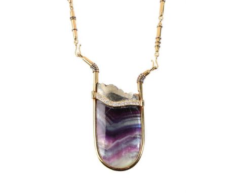 
	
		Y&nbsp;An 18 carat gold fluorite, pyrite, diamond, emerald, sapphire and mother of pearl pendant, the fluorite panel set