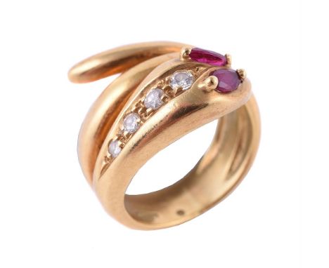 
	
		A ruby and diamond snake ring, the coiled serpent with marquise cut ruby eyes and brilliant cut diamond accented head, a