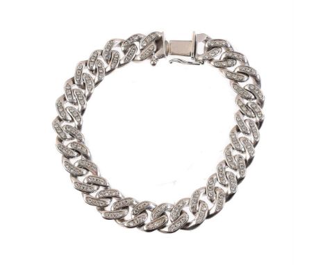 
	
		A diamond set curb link bracelet, the curb links set with eight cut diamonds, approximately 1.30 carats total, stamped 7