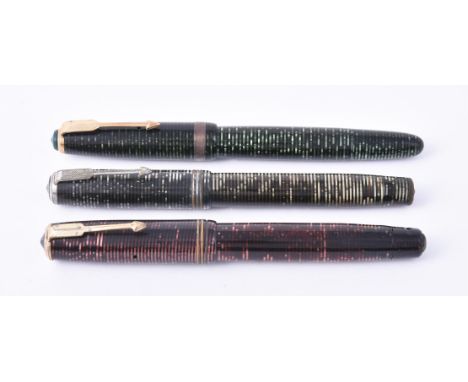 
	
		Parker, Vacumatic, three striped fountain pens, in burgundy pearl, emerald pearl and silver pearl (3)

	

