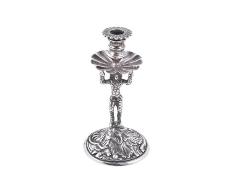 A Victorian silver Harlequin taper stick by William Wrangham Williams, London 1874, with a shaped circular sconce and drip pa