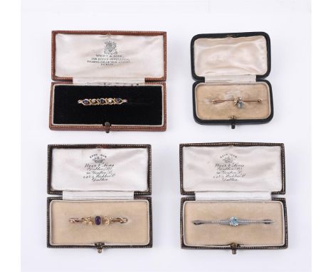 
	
		Four early 20th century bar brooches, comprising a 1930s blue zircon bar brooch, the circular cut blue zircon on a polis