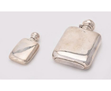 
	
		An Edwardian silver spirit flask by G. &amp; J. W. Hawksley, Sheffield 1908, 12cm high; and another by Hubert Hall, Ches