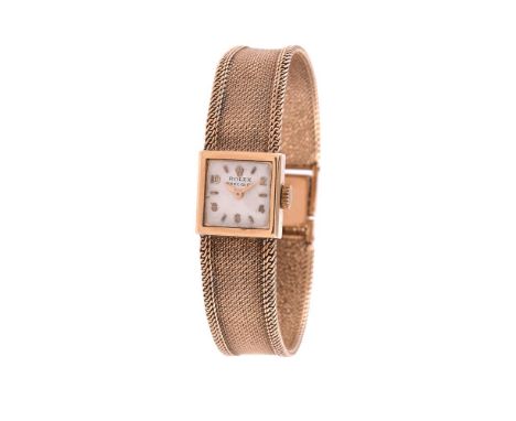 
	
		Rolex, 
		Lady's 9 carat gold bracelet watch, no. 29344, circa 1965
		Movement: Cal. 1401, manual wind, 18 jewels
		Case