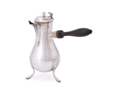 
	
		A French silver baluster coffee pot, Paris 1798 - 1809, with a circular finial to the domed cover, a scroll thumb piece,