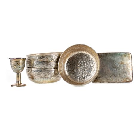 SET OF FOUR 20TH CENTURY EASTERN SILVER CIRCULAR BOWLS, embossed with scrolling foliate designs, 11cm diameter, along with a 