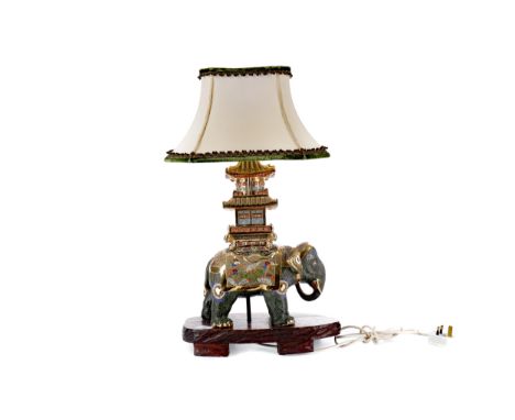 EARLY 20TH CENTURY JAPANESE SATSUMA TABLE LAMP, modelled in the form of an elephant topped with a tiered pavilion, in coloure