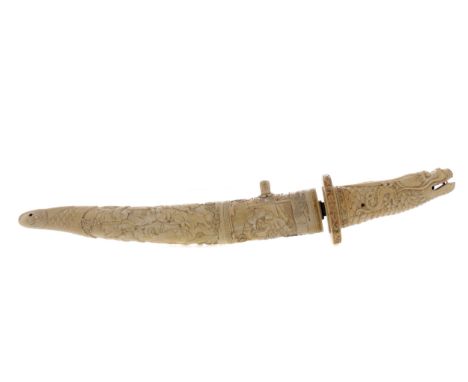 FINE JAPANESE IVORY TANTO, Meiji period, the handle and scabbard each formed in a single section of ivory, the handle carved 