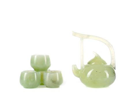 CHINESE GREEN JADE WINE POT AND FOUR CUPS, of small proportions, the pot with detachable lid, 13cm high, the circular cups ea