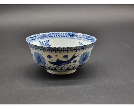 A Chinese blue and white bowl, Kangxi four character seal mark to base painted with fish, 17.5cm diameter, (cracked). 