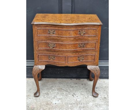 A small reproduction burr walnut serpentine fronted chest of drawers, on cabriole legs, 61.5cm wide. 
