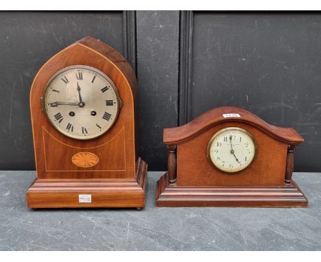 An Edwardian mahogany and inlaid lancet form mantel clock,&nbsp;32cm high, with pendulum; together with another 1920s mahogan