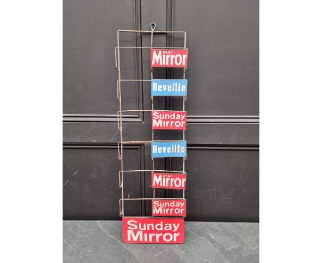 Advertising: a vintage wirework newspaper stand, 87.5 x 25.5cm.&nbsp; 