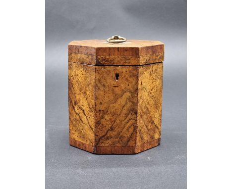 A George III figured walnut and parquetry octagonal tea caddy,&nbsp;14.5cm high, with key. 